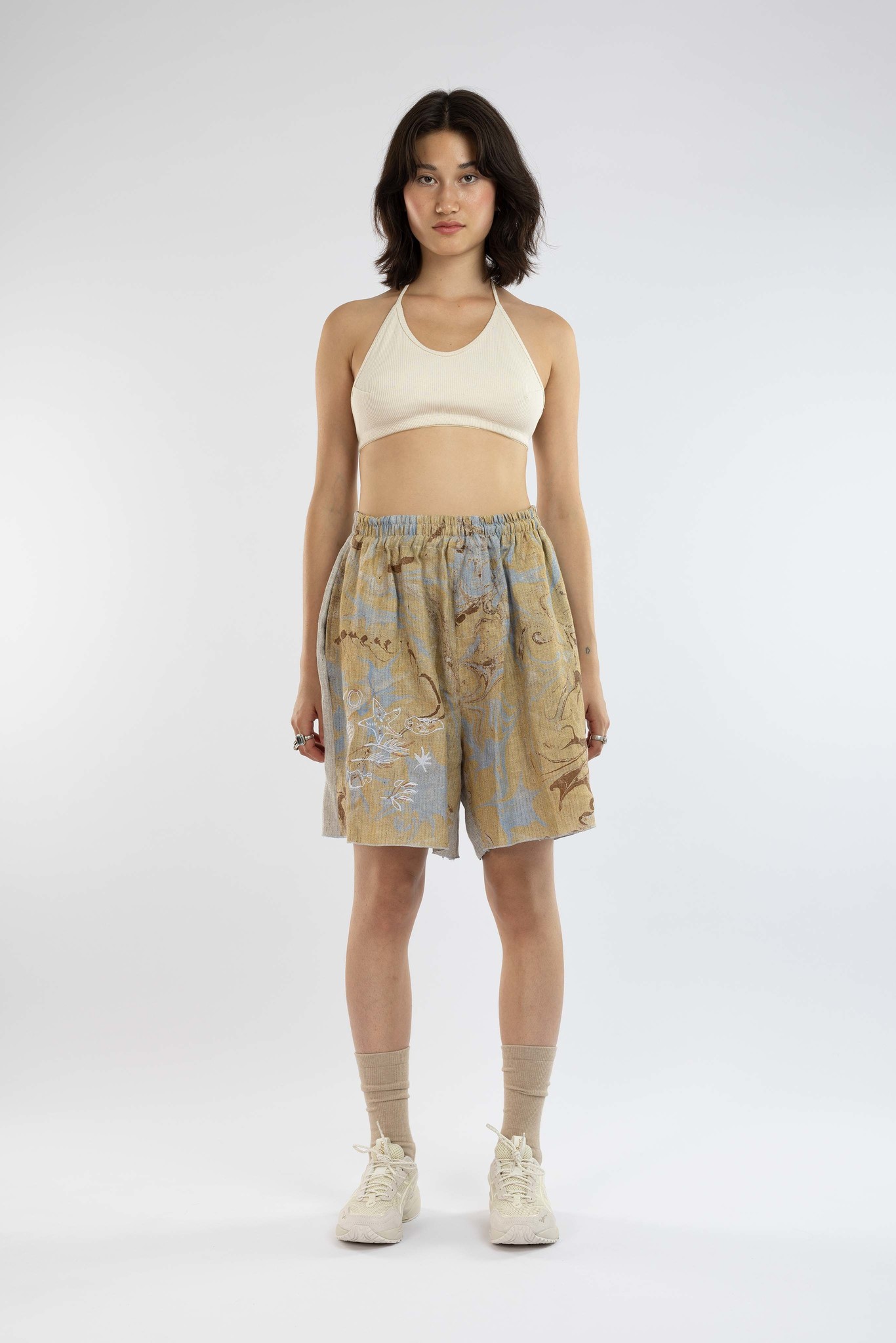 grey short with gathered sea things