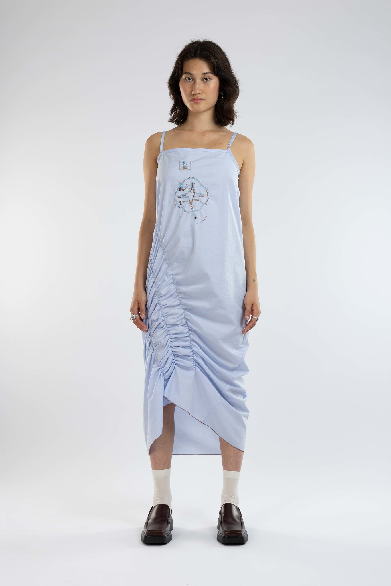 blue dress with blue crossings