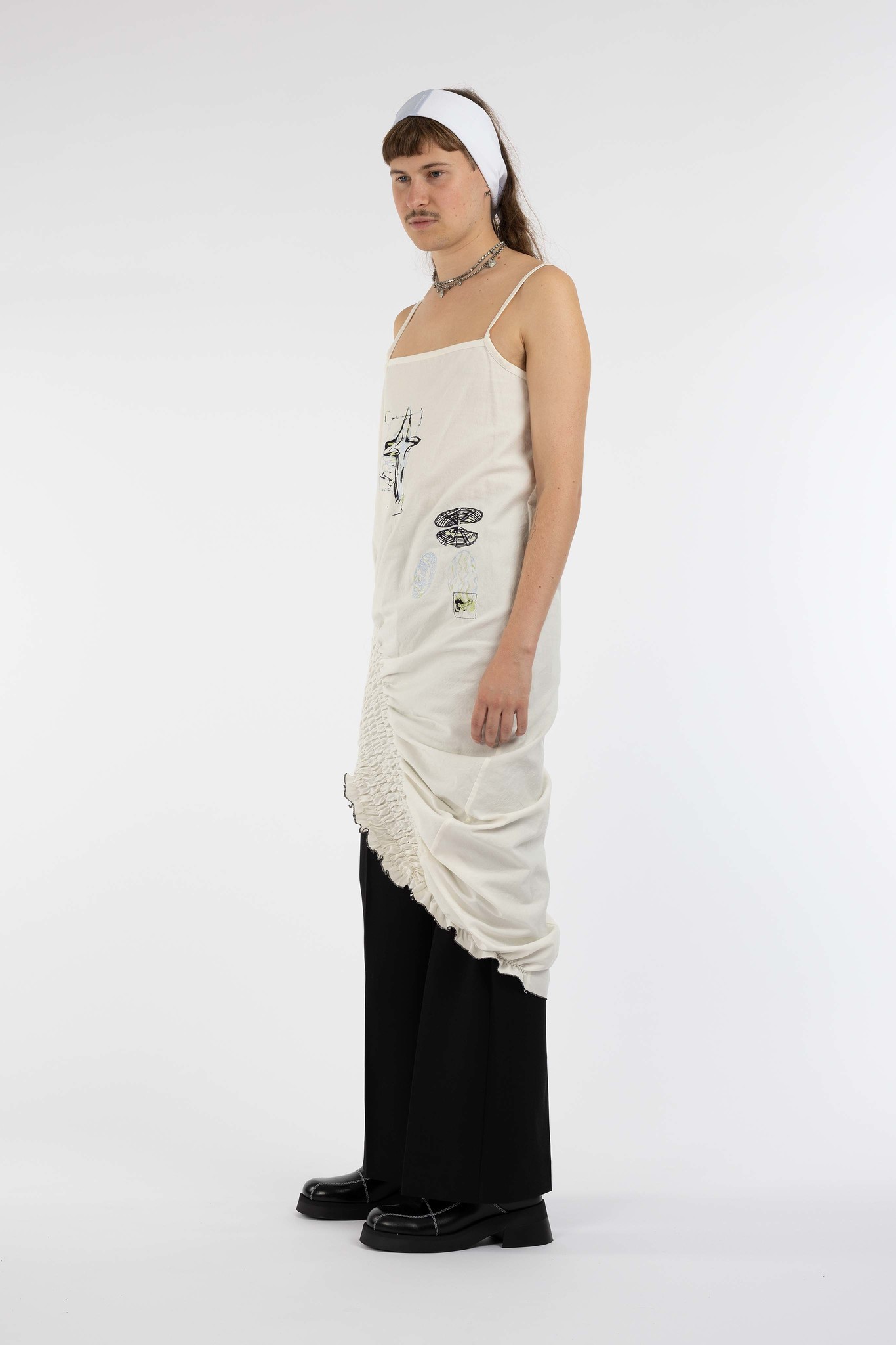 white dress with cross misérable