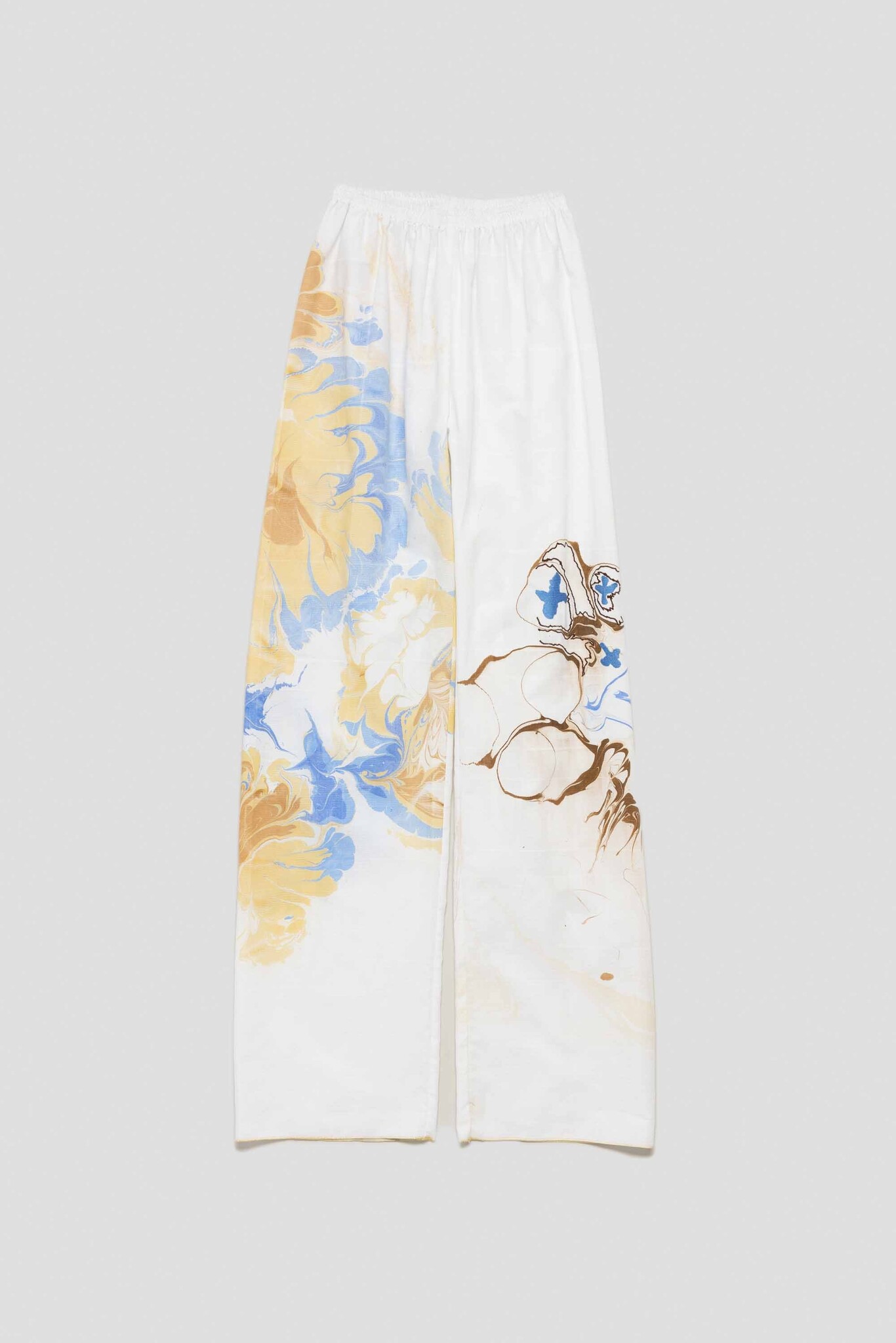 white trousers with breaking waves