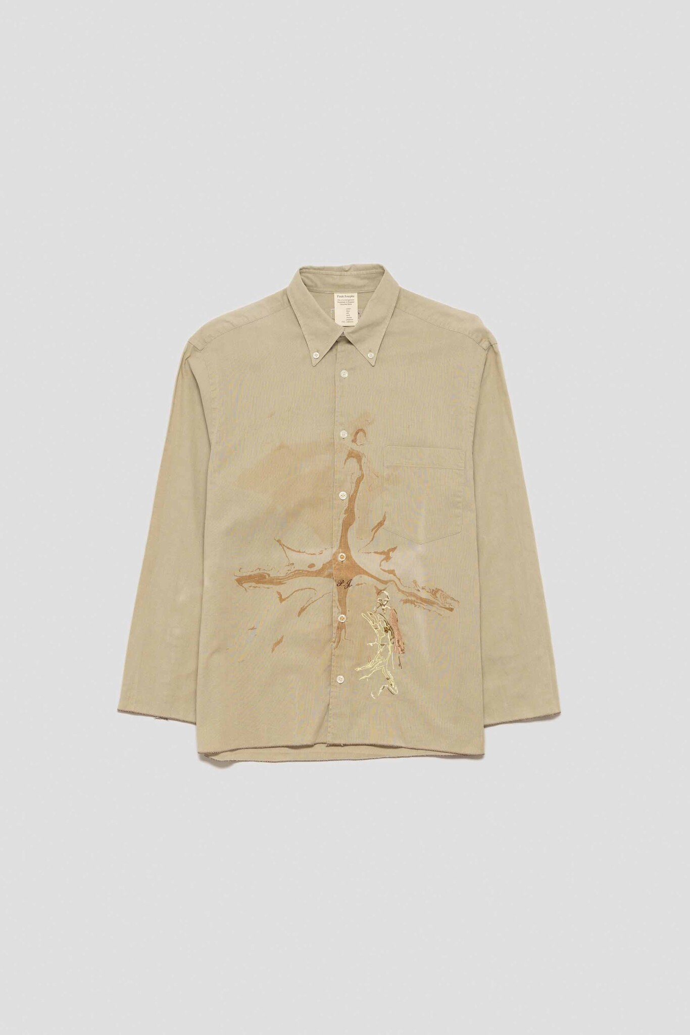 beige shirt with hare lady and the cross