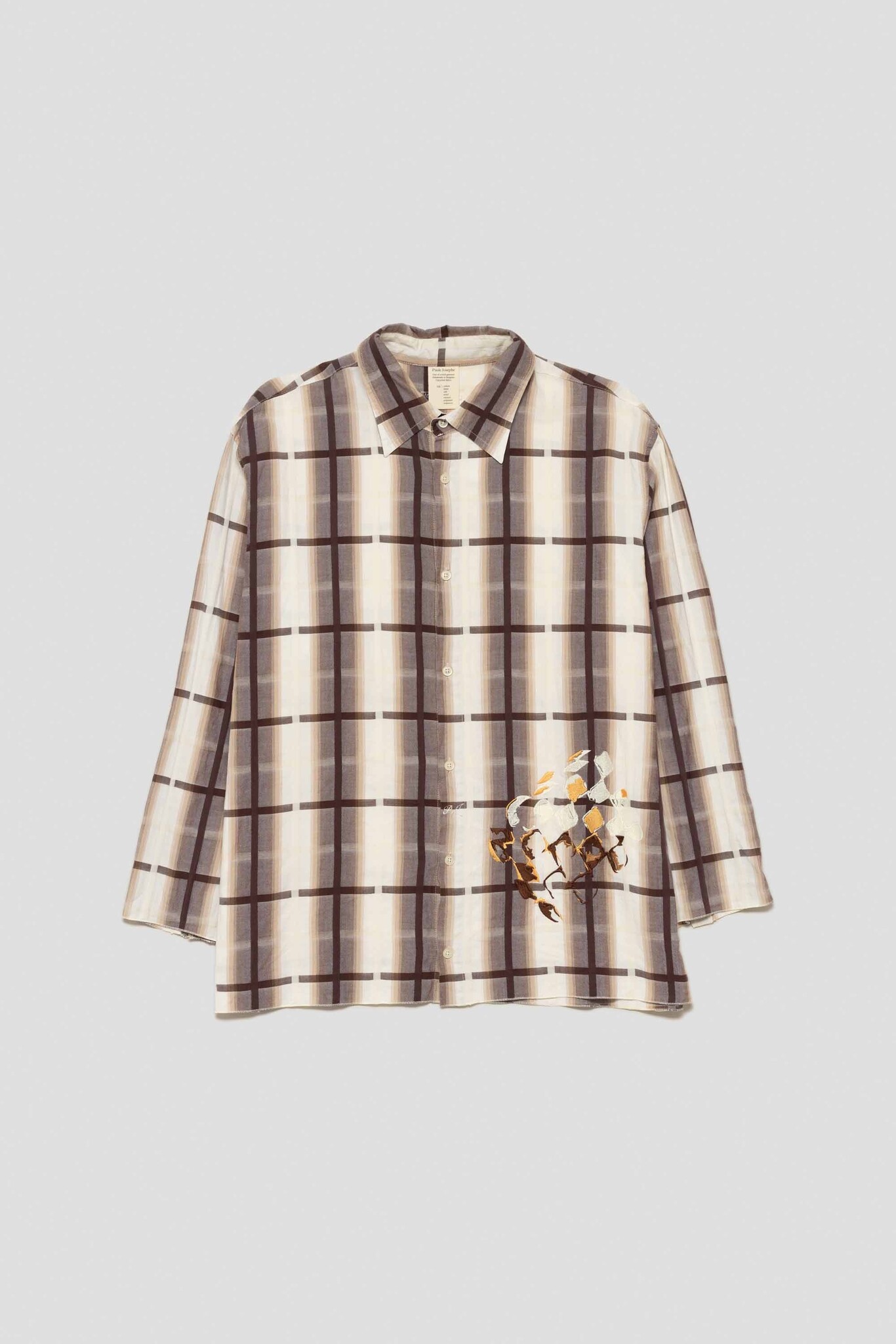 brown shirt with checkerboard galette