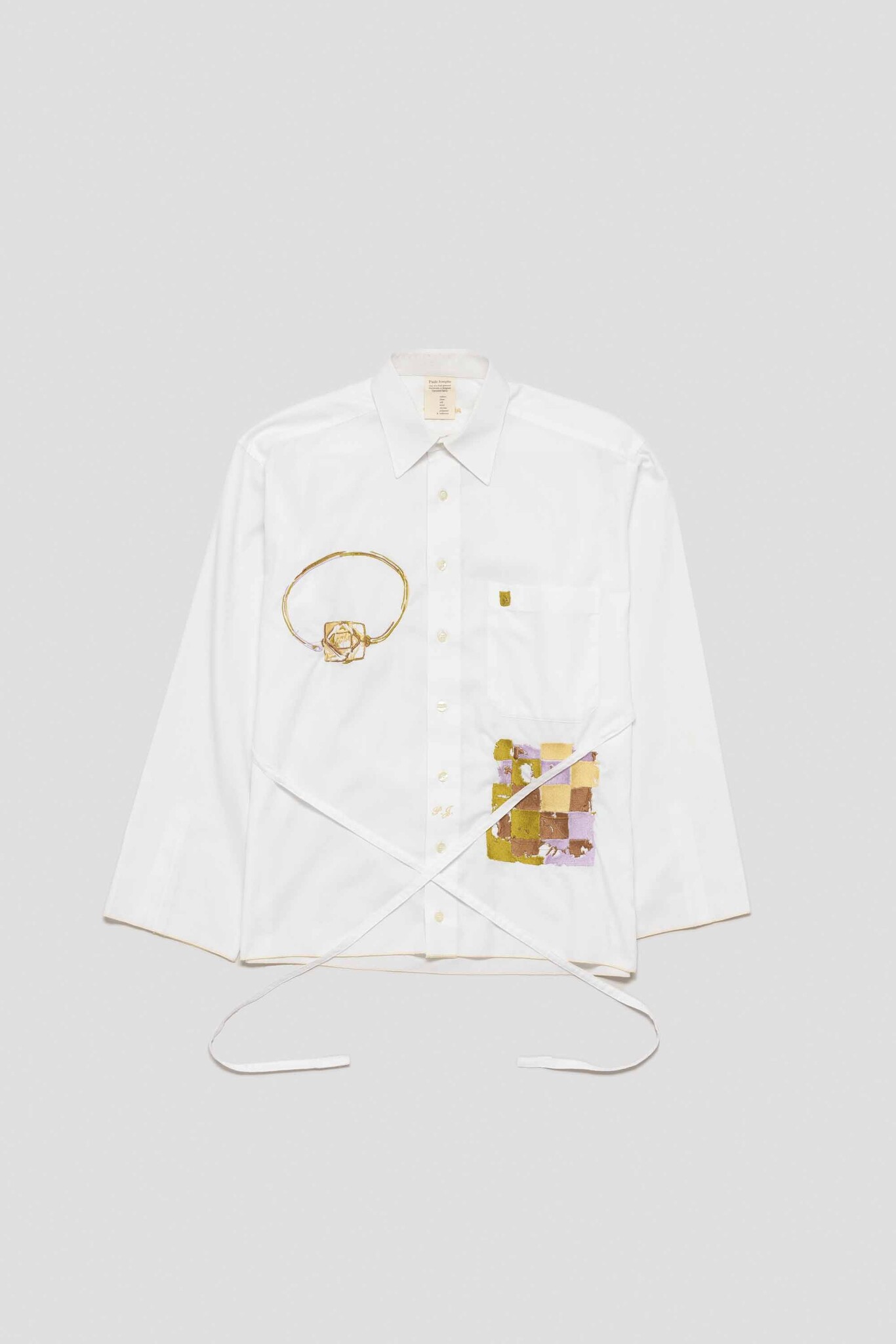 white shirt with fragmented glass window