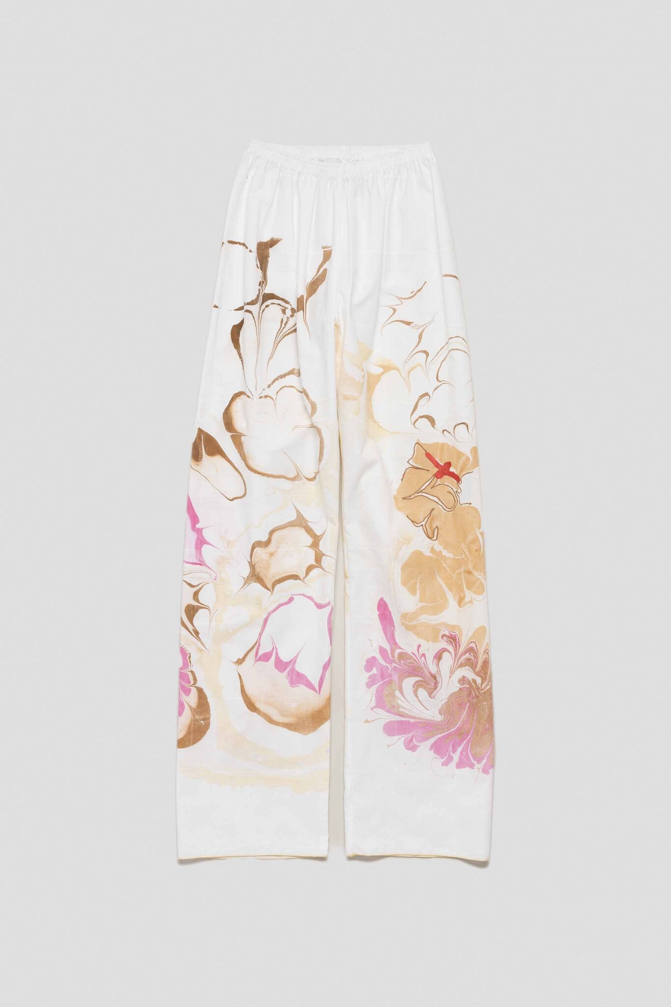 white trousers with rose earth holes