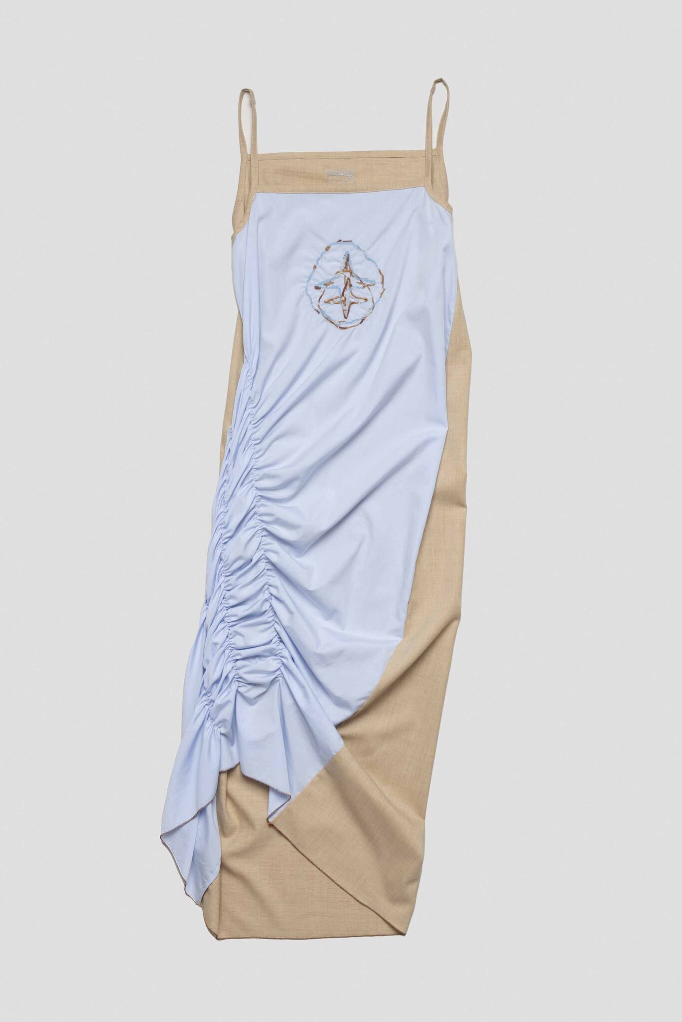 blue/beige dress with blue crossings