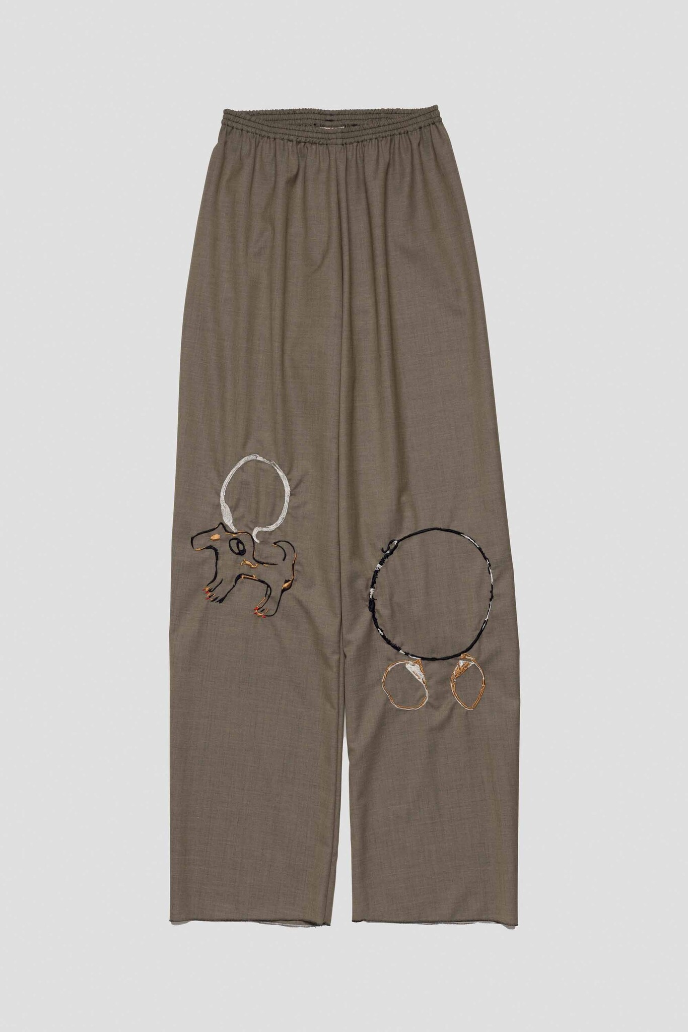 brown trousers with red nailed dog