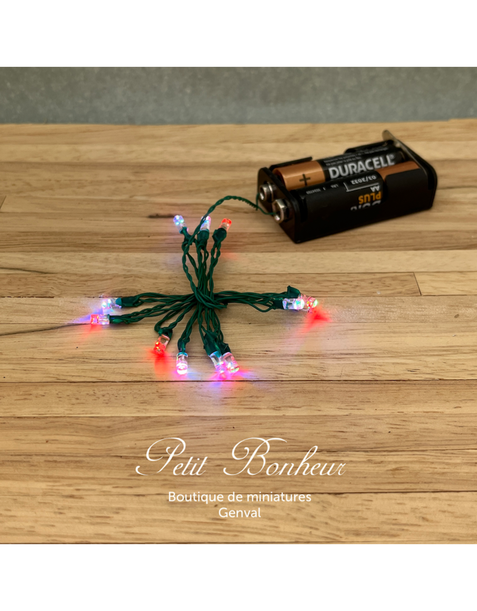 Guirlande lumineuse de Noël, 12 LED colorés, sur piles 3 Volts