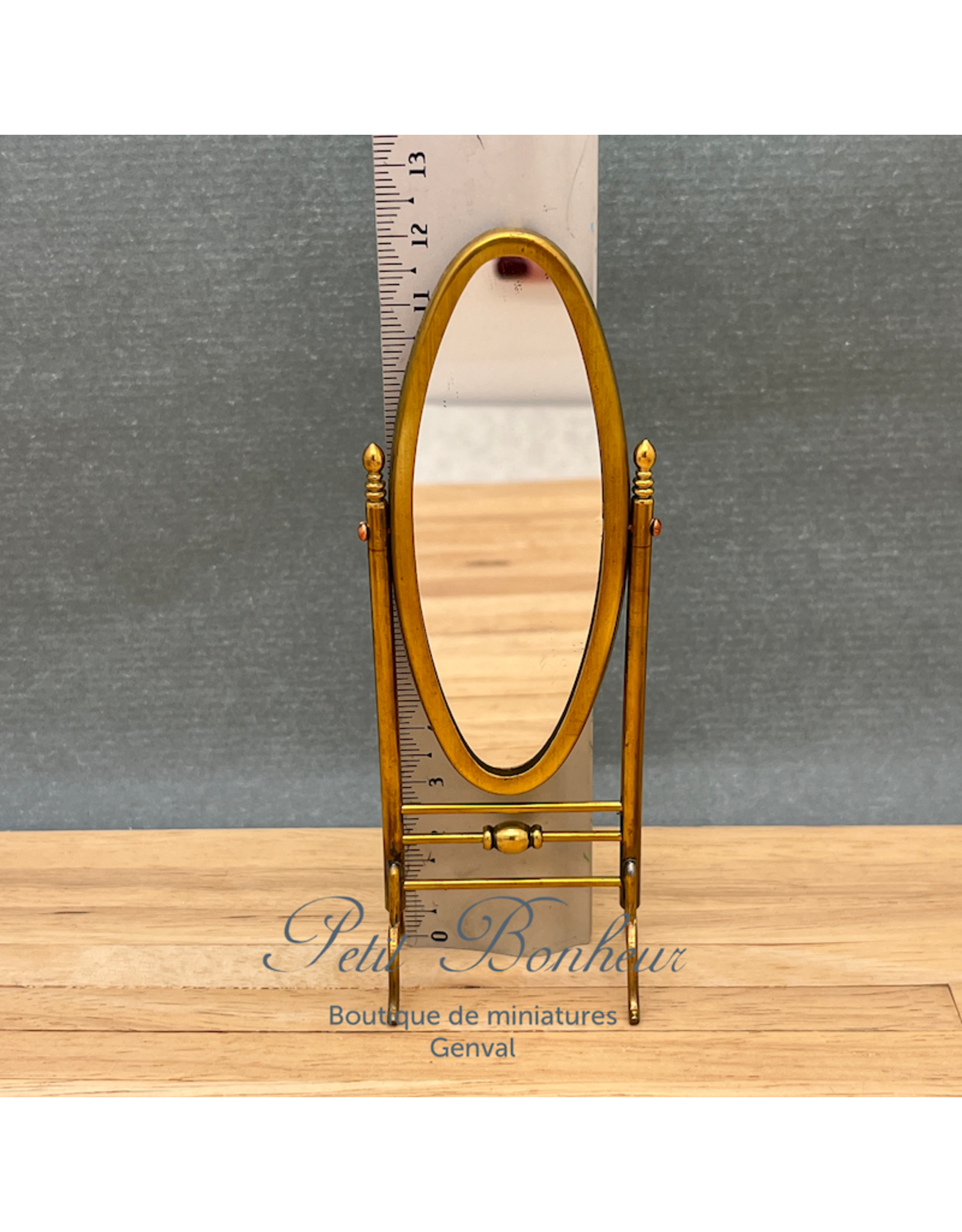 Miroir oval pivotant laiton doré vielli