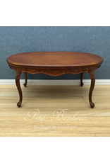 Table ovale sculptée Louis XV noyer