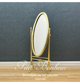 Miroir oval sur pieds doré