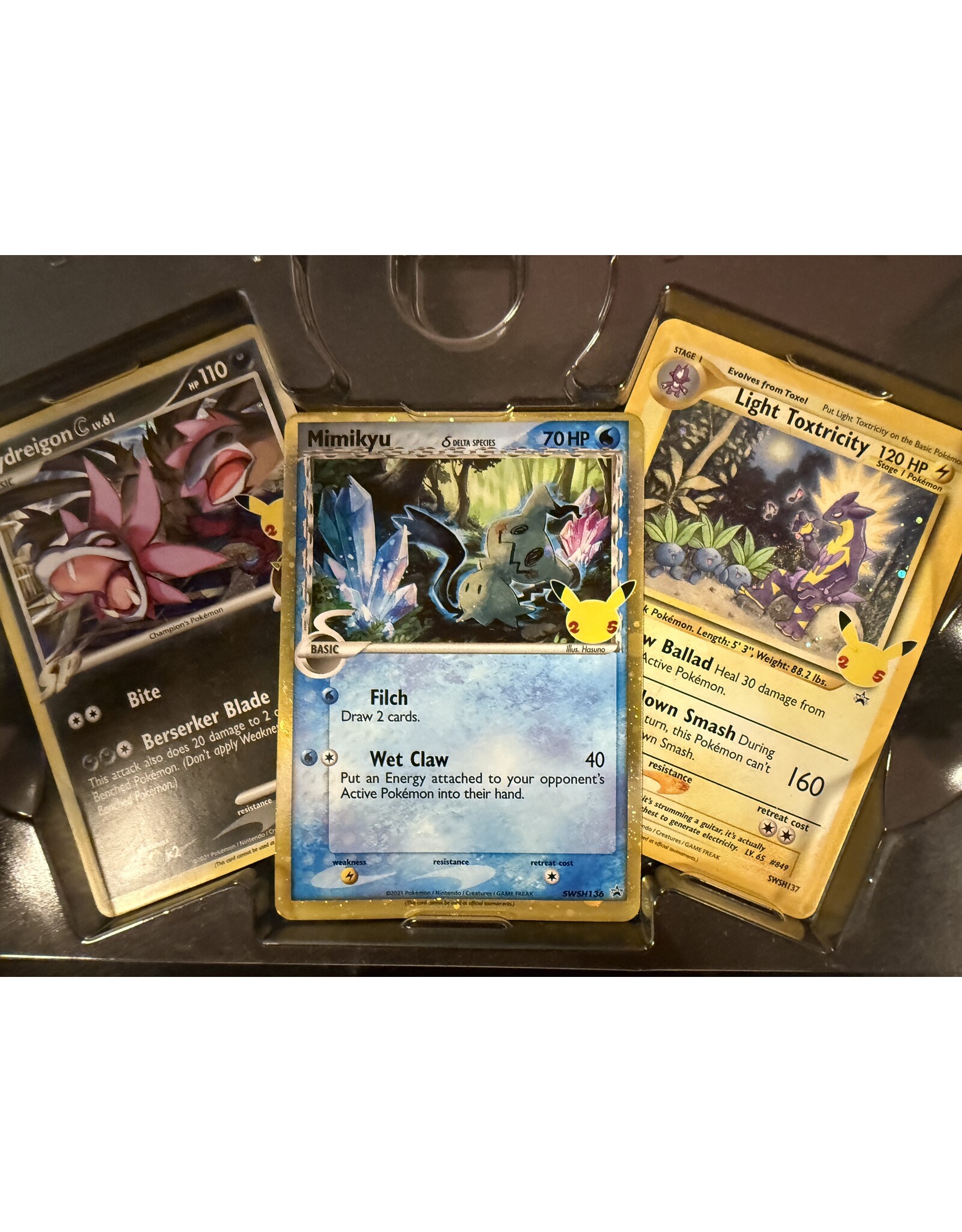 Hydreigon [C] Lv.61 SWSH 138, Light Toxtricity SWSH 137, Mimikyu δ Delta Species SWSH 136