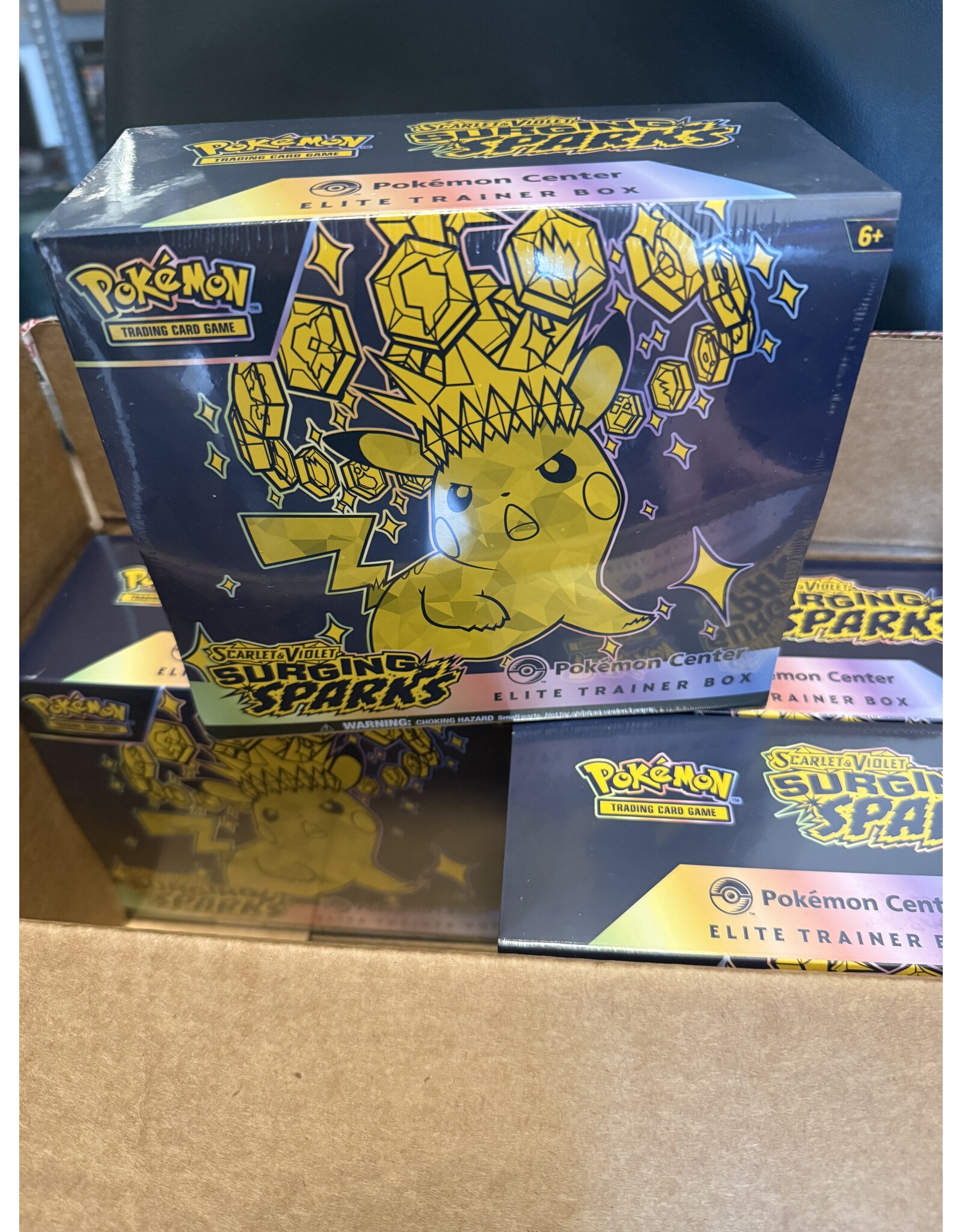 Surging Sparks Pokémon Center Elite Trainer Box
