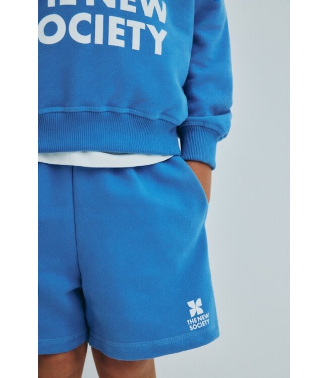 The New Society TNS Logo Short Iris Whisper