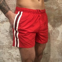 Swimshort taped red