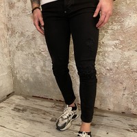 Dwayne Damaged black