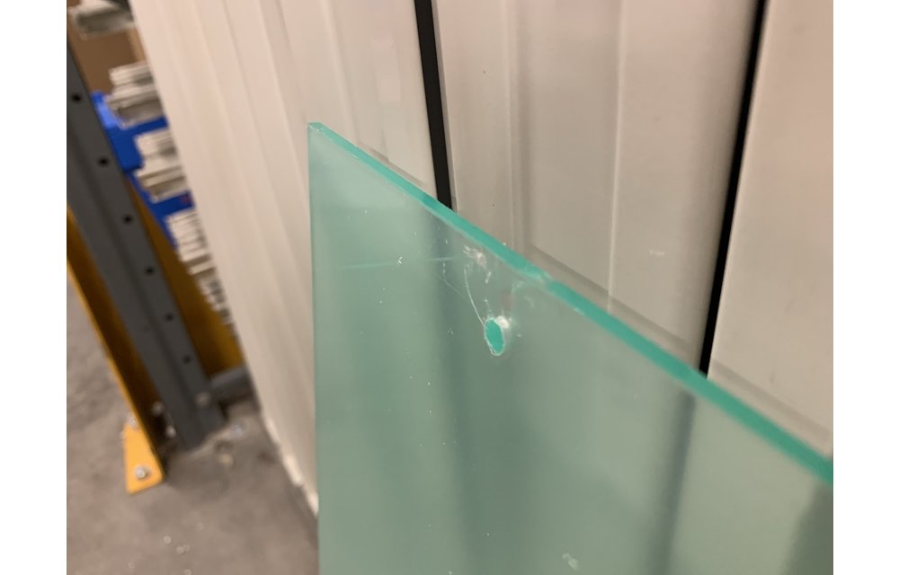 Protective plate for ceiling suspension