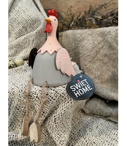 ## Zittende metalen kip "Sago" - 8 x 12 cm