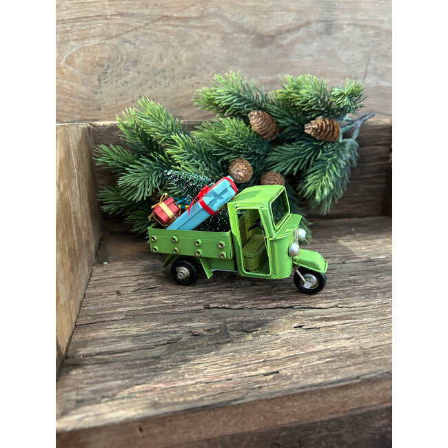 # Groene tuktuk kerst