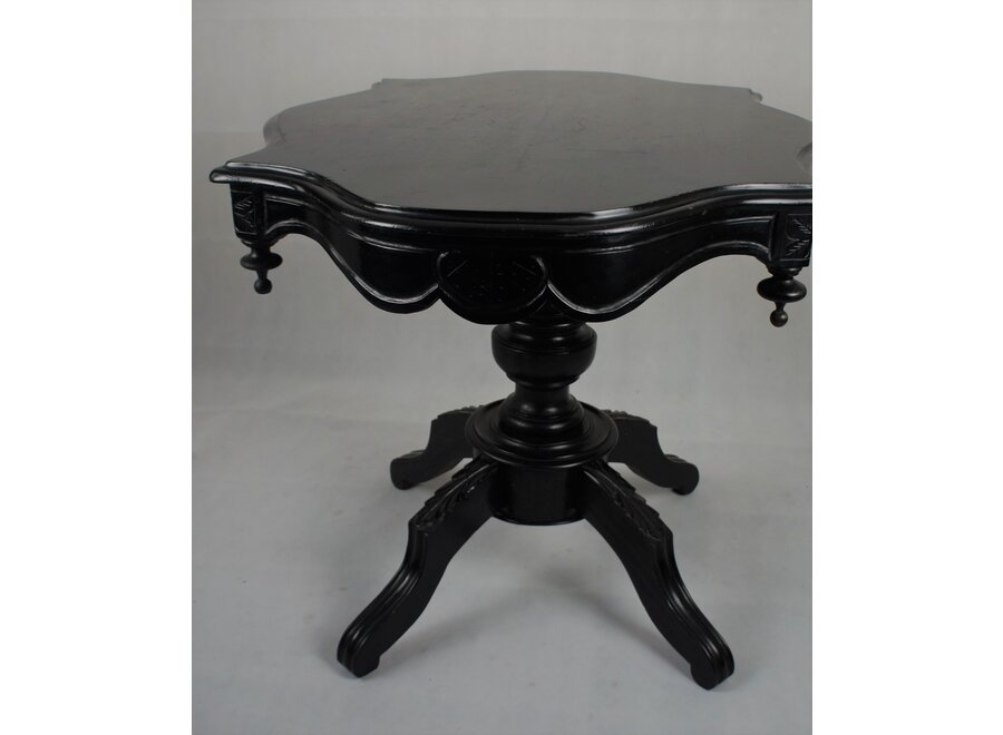 This romantic table was restored a few years ago and painted in black.