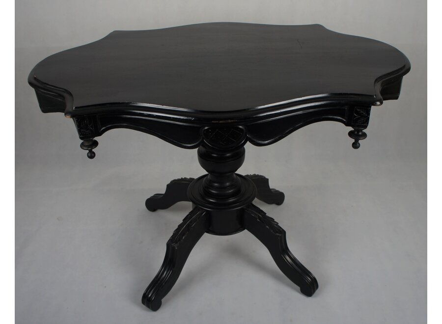 This romantic table was restored a few years ago and painted in black.