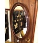Beautiful oval Edwardian mahogany frame with cut mirror