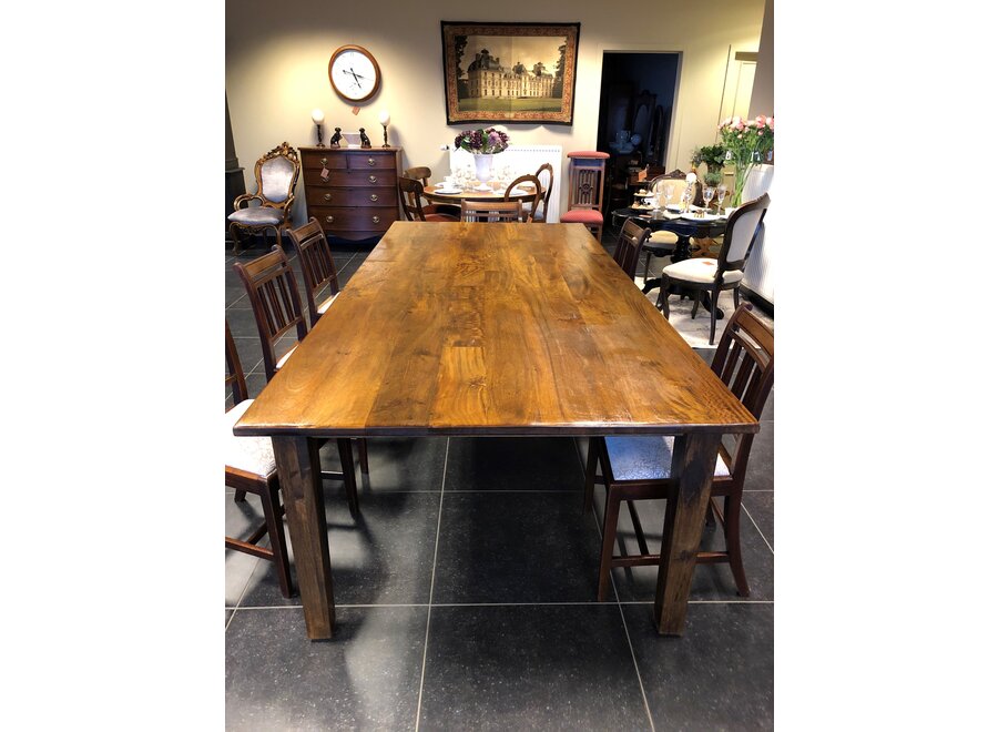 Large table in dark solid oak