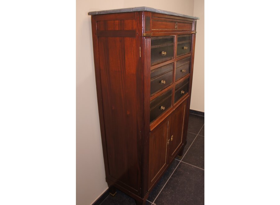 This cartonnière was finished in full wood and leather instead of cardboard