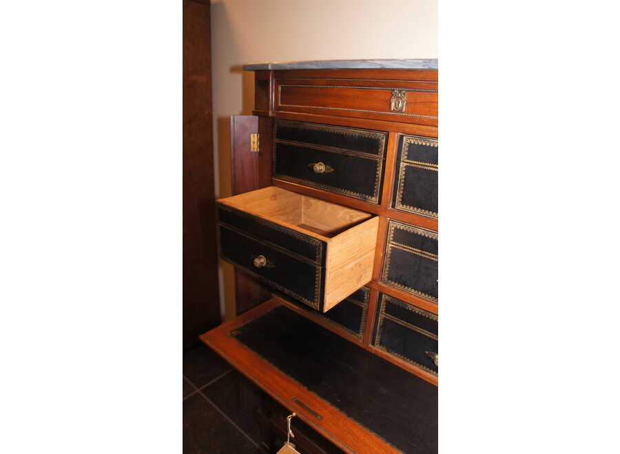This cartonnière was finished in full wood and leather instead of cardboard