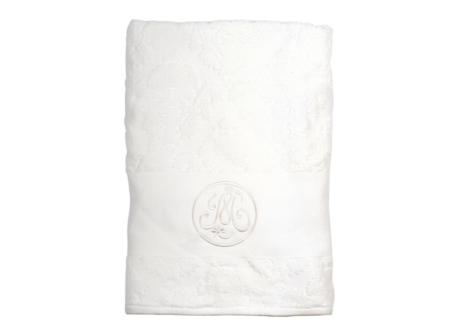 Witte geborduurde badhanddoek