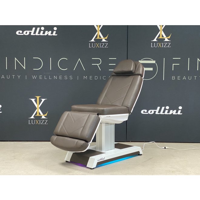 Treatment chair without armrests