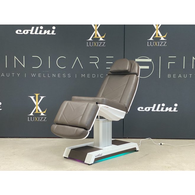 Treatment chair without armrests