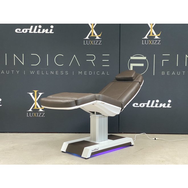 Treatment chair without armrests