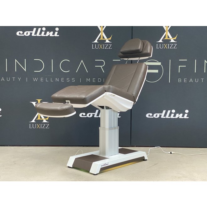 Treatment chair without armrests