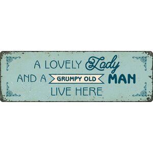 Metallschild A Lovely Lady and a Grumpy Old Man Live Here 27x9 cm