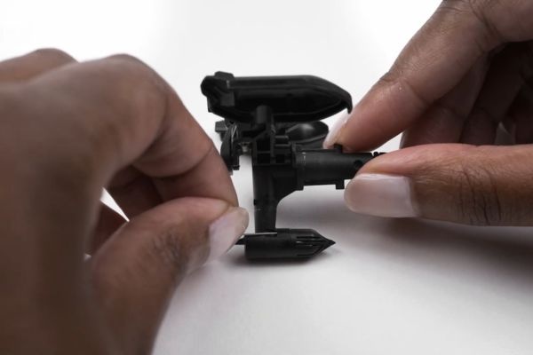 Dolce Gusto Neo spuitstuk reinigen