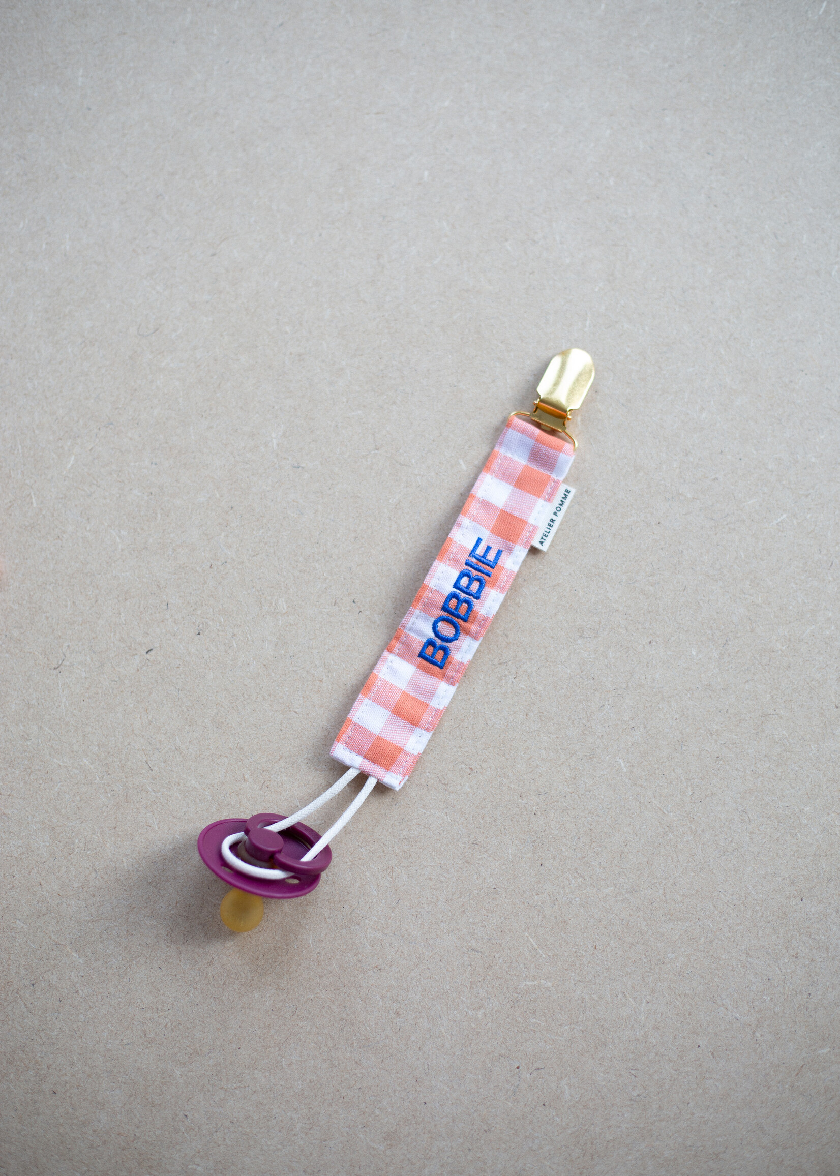 Atelier POMME KEEP-IT-CLOSE - STICKY BIBS CHECKED IN - HAPPY ORANGE