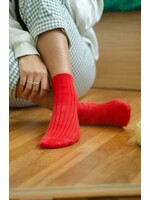 HER SOCKS RED