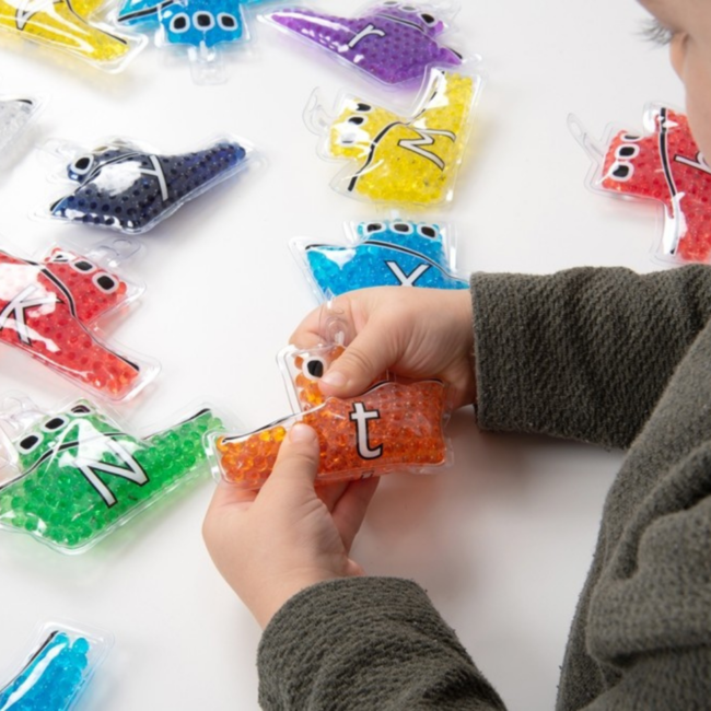 Tickit Commotion Sensomotorisch speelgoed - regenboog gelbootjes, alfabet