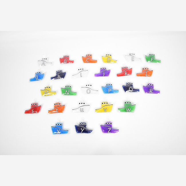 Tickit Commotion Sensomotorisch speelgoed - regenboog gelbootjes, alfabet