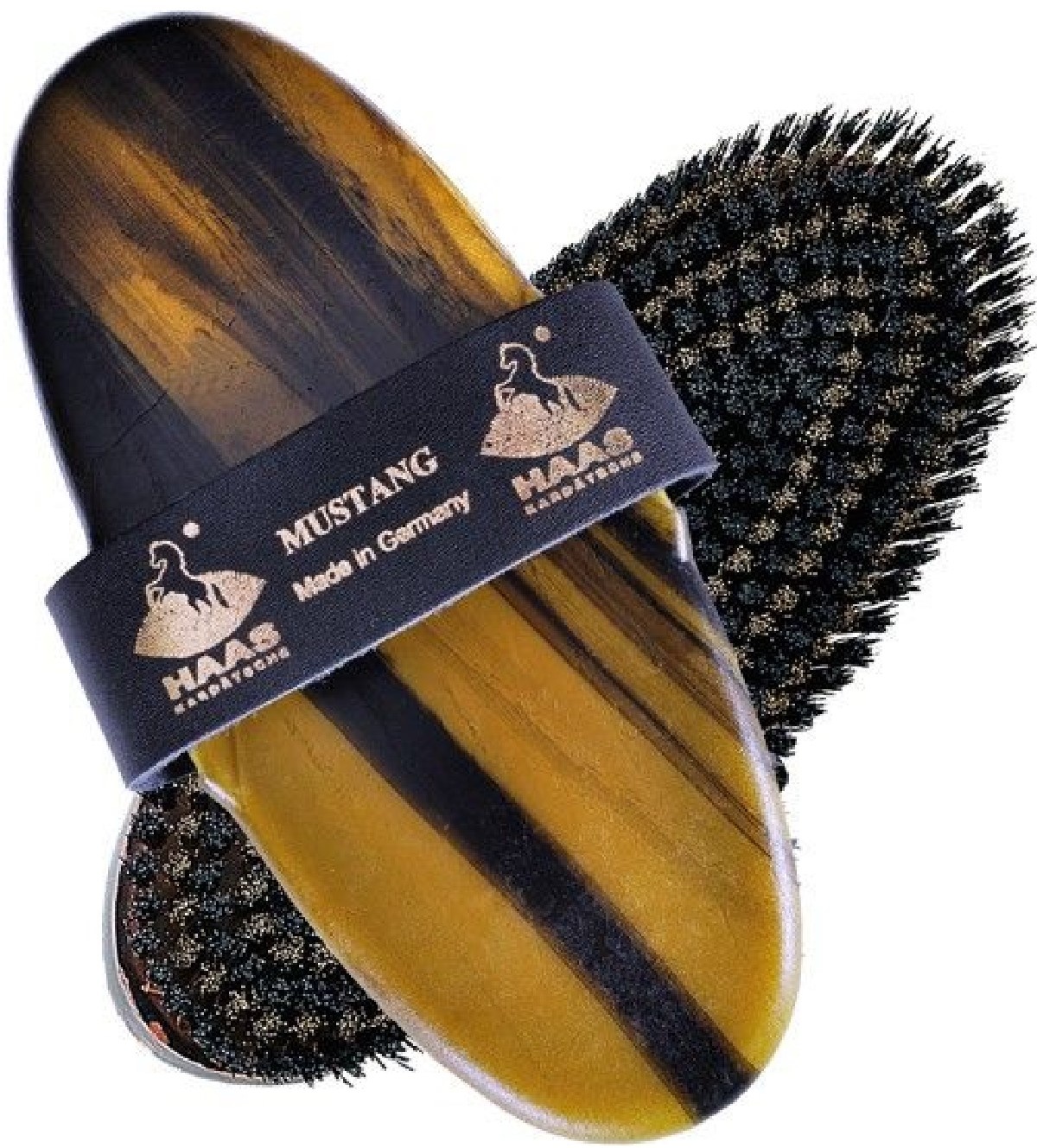 firmly brush Mustang for the coat of the horse