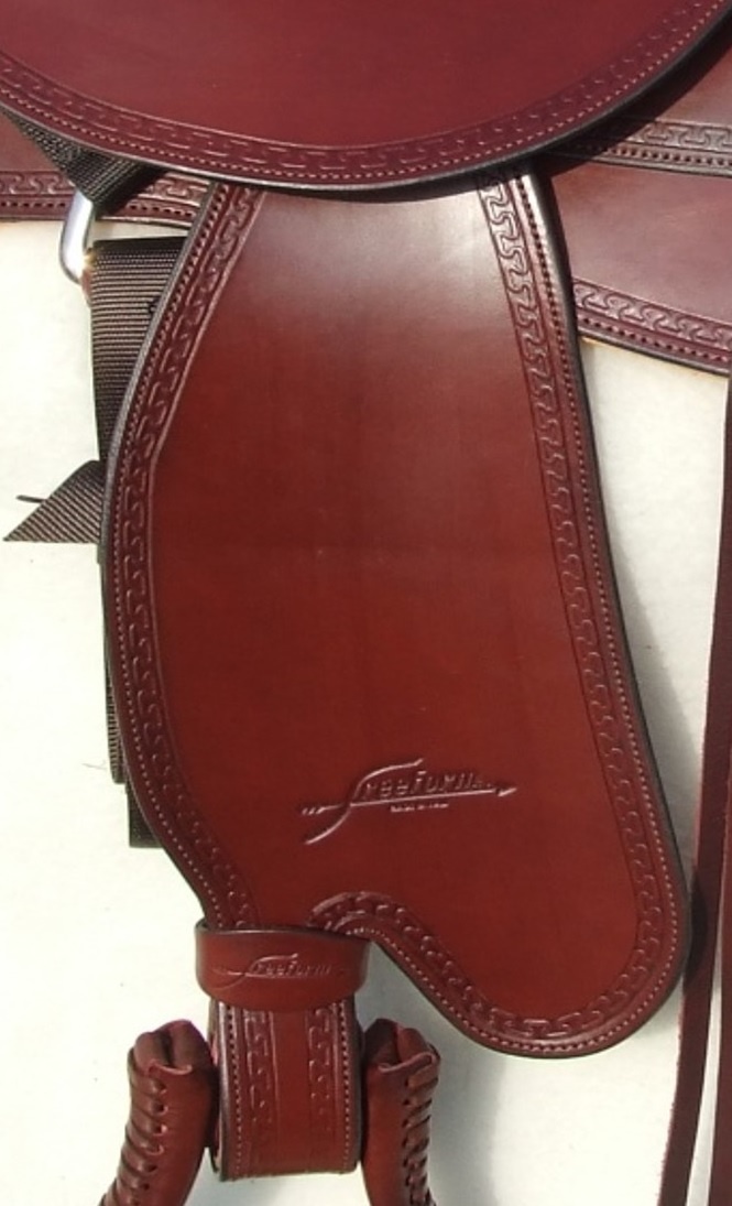 Western fender met blevin gespen