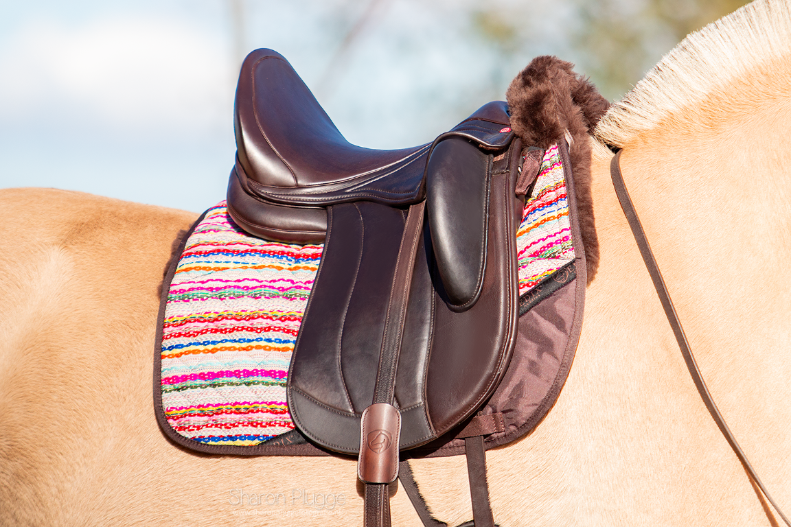 Brightstar dressuur pad met inlages lamsvel