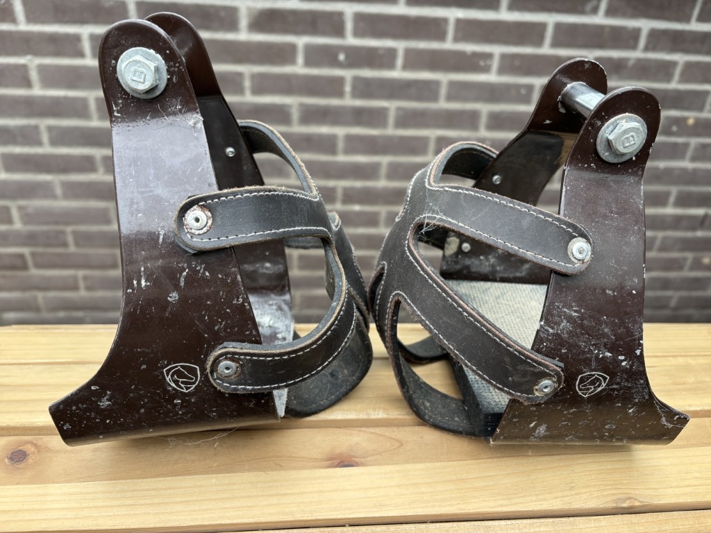 Western stirrups in need of refurbishment brown foot pads are loose
