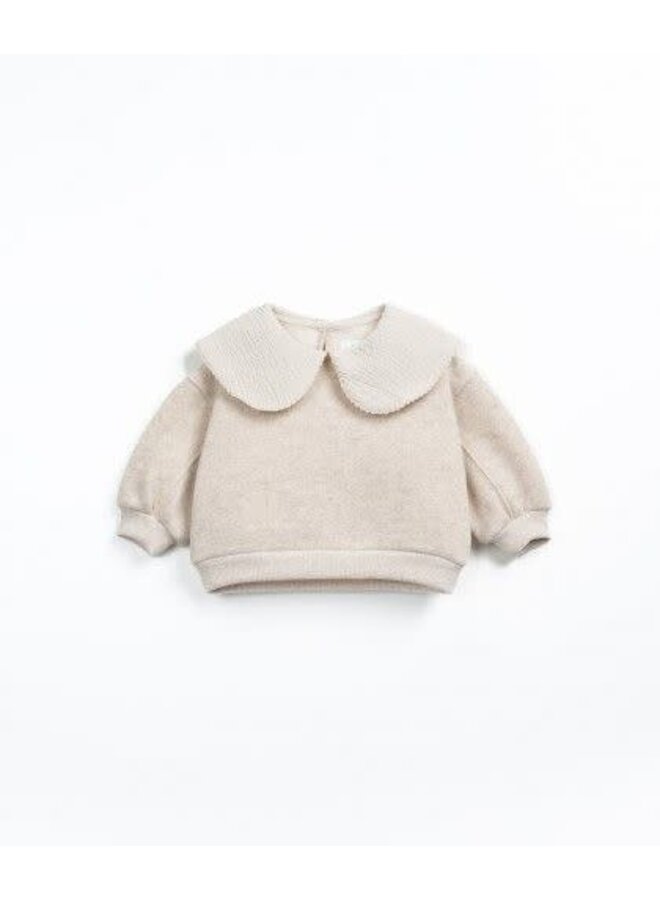 Play up fleece sweater tones