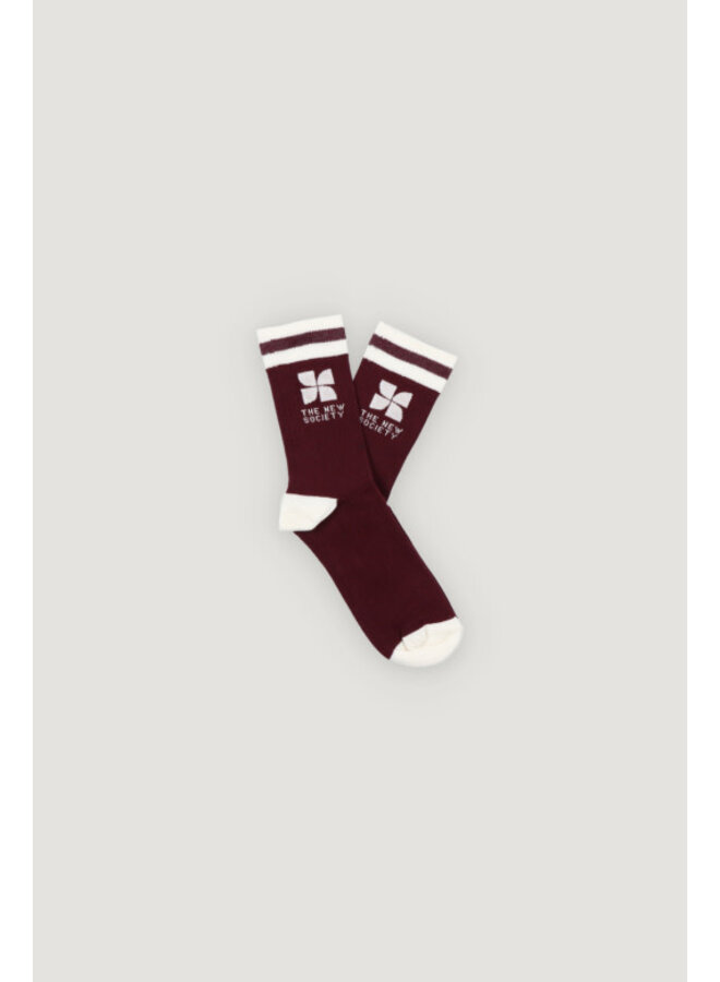 The new society logo socks winetasting