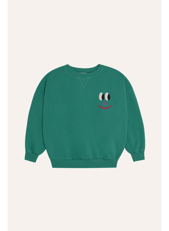 The campamento smiling face green sweatshirt