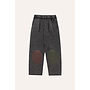 The campamento bicolor patches denim trousers grey