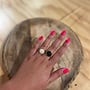 Ellen beekmans ring met grote gemstone roze/groen