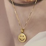 Ellen beekmans ketting met grote smiley