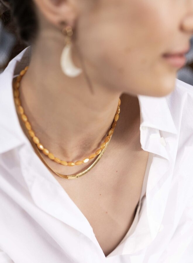 Ellen Beekmans schelpen ketting geel